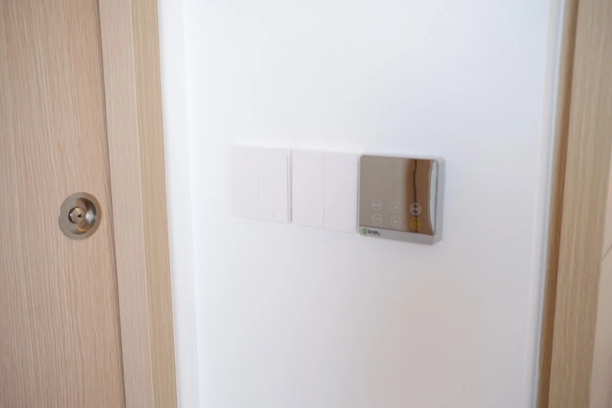 Wall controls beside a timber entrance door
